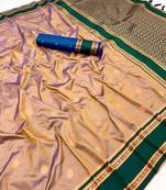 Brown soft silk saree with dual zari motifs, narayan border & contrast pallu