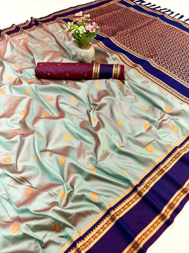 Grey soft silk saree with dual zari motifs, narayan border & contrast pallu