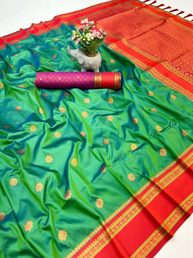 Green soft silk saree with dual zari motifs, narayan border & contrast pallu