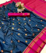 Teal soft silk saree with dual zari motifs, narayan border & contrast pallu