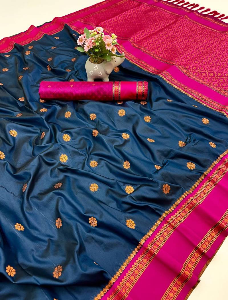 Teal soft silk saree with dual zari motifs, narayan border & contrast pallu