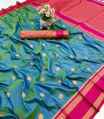 Teal soft silk saree with dual zari motifs, narayan border & contrast pallu