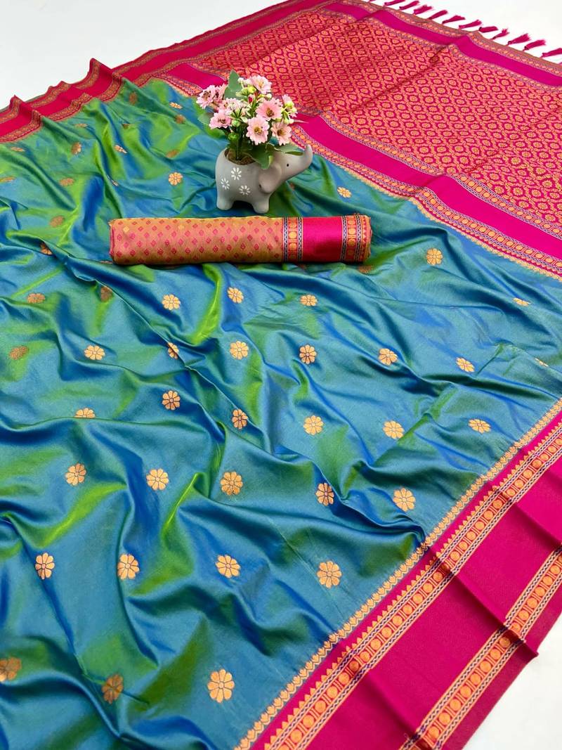 Teal soft silk saree with dual zari motifs, narayan border & contrast pallu