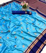 Sky blue soft silk saree with dual zari motifs, narayan border & contrast pallu