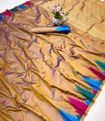 Brown soft silk saree with temple border, dual zari motifs & contrast pallu