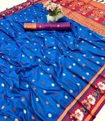 Teal premium soft silk saree with floral border & dual zari motifs