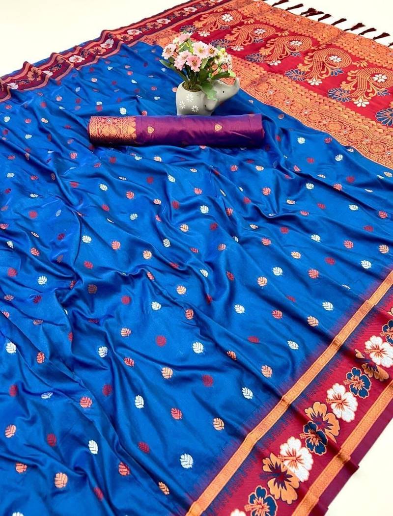 Teal premium soft silk saree with floral border & dual zari motifs