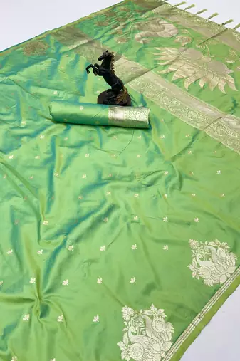 Light green banarasi silk saree with swan zari motifs & designer pallu