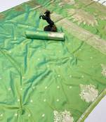 Light green banarasi silk saree with swan zari motifs & designer pallu