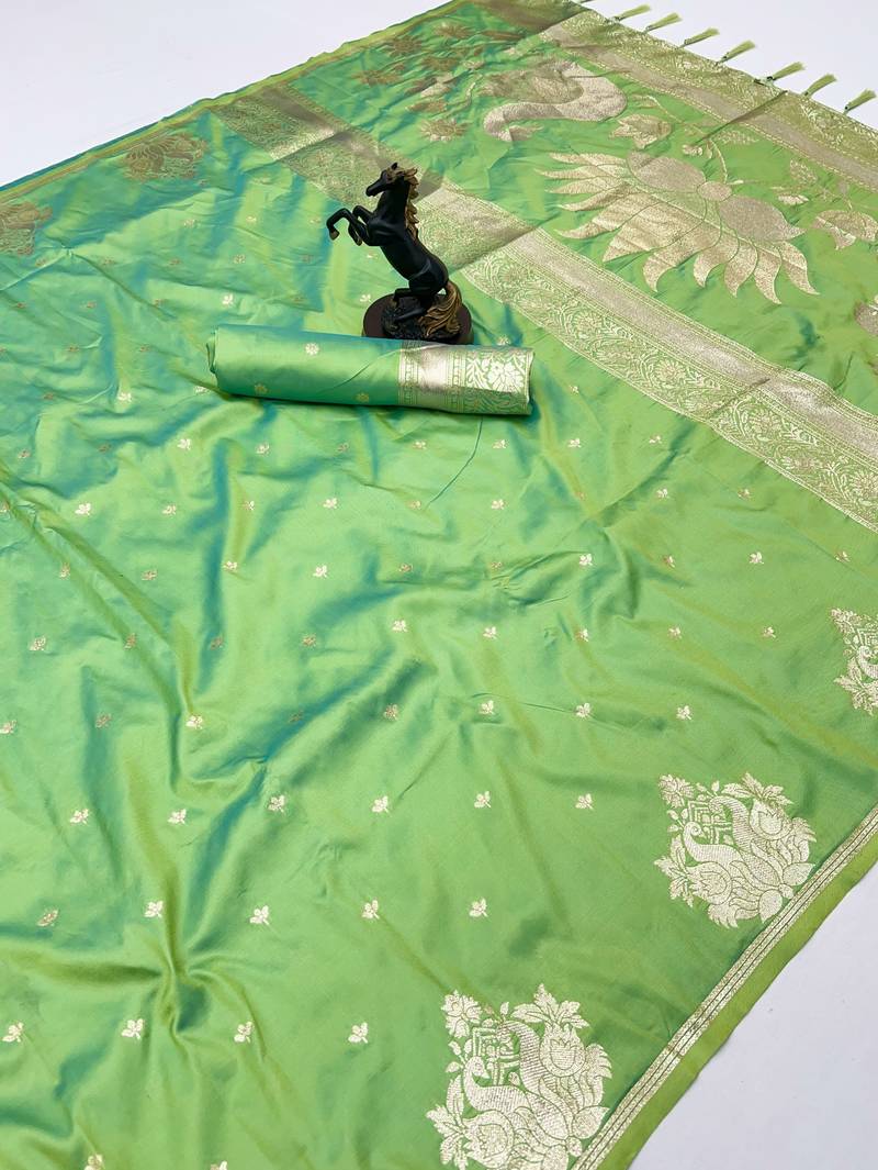 Light green banarasi silk saree with swan zari motifs & designer pallu