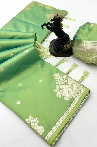 Light green banarasi silk saree with swan zari motifs & designer pallu