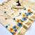 Cream tissue kerala kasavu saree with floral embroidery design