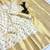 White banarasi silk saree with self weaving gold zari design
