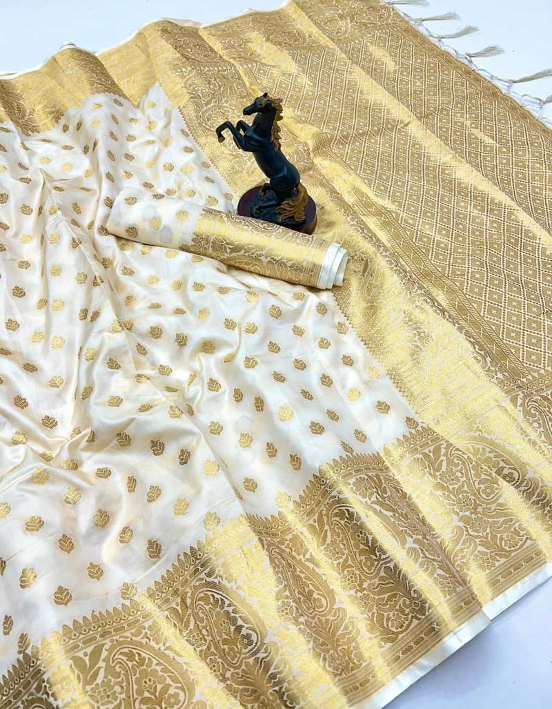 White banarasi silk saree with self weaving gold zari design