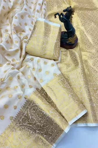 White banarasi silk saree with self weaving gold zari design