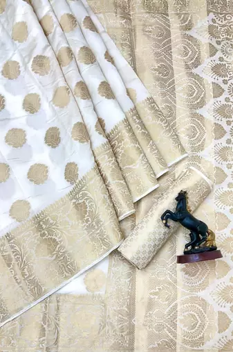 White banarasi silk saree with self weaving gold zari design