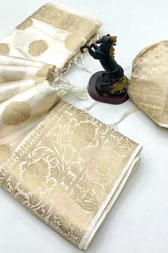 White banarasi silk saree with self weaving gold zari design