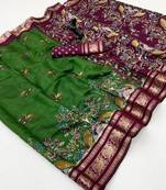 Green viscose silk kalamkari saree with peacock motif design