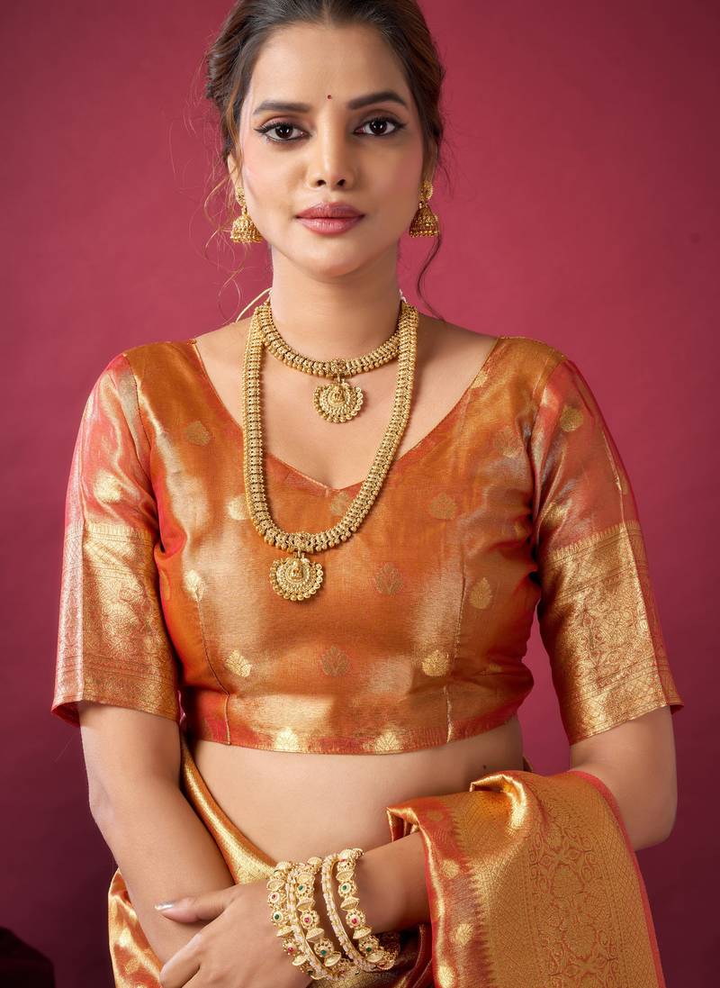 Elegant tissue silk saree with zhallar border – lightweight & shimmering drapape