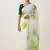 Green woven linen saree with blouse piece