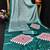 Turquoise printed satin saree with blouse piece