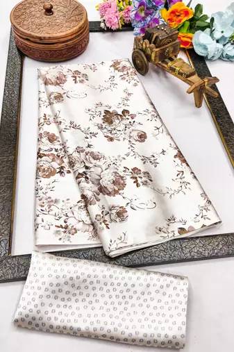 White printed satin saree with blouse piece