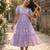Purple muslin silk printed checked fit and flared dresses