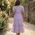 Purple muslin silk printed checked fit and flared dresses