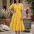 Yellow muslin silk printed checked fit and flared dresses