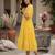 Yellow muslin silk printed checked fit and flared dresses