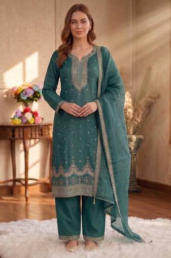 Teal green silk unstitched suit with embroidery & sequence work