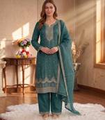 Teal green silk unstitched suit with embroidery & sequence work