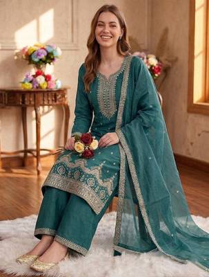 Teal green silk unstitched suit with embroidered sequin  2