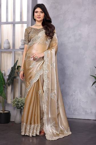 Beige embroidered embellished shimmer chiffon bollywood saree with blouse