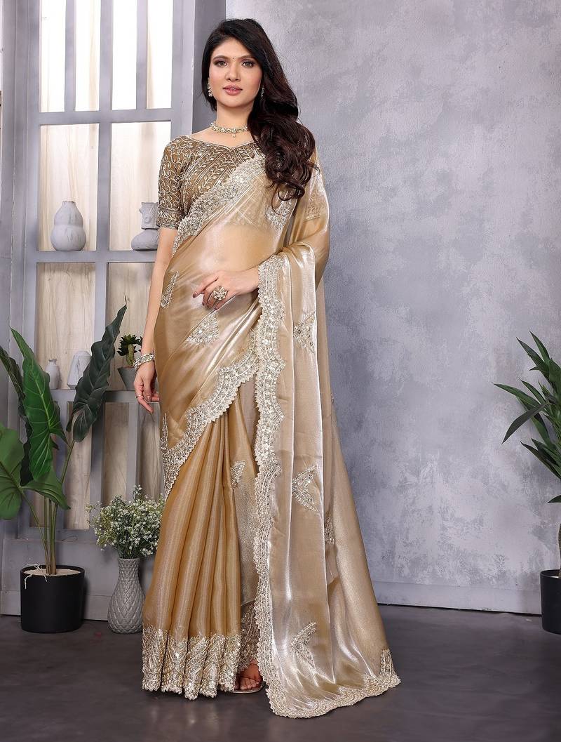 Beige embroidered embellished shimmer chiffon bollywood saree with blouse