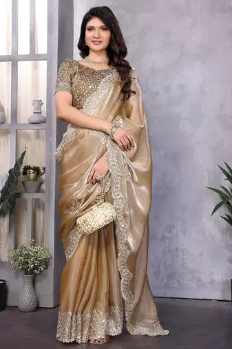 Beige embroidered embellished shimmer chiffon bollywood saree with blouse