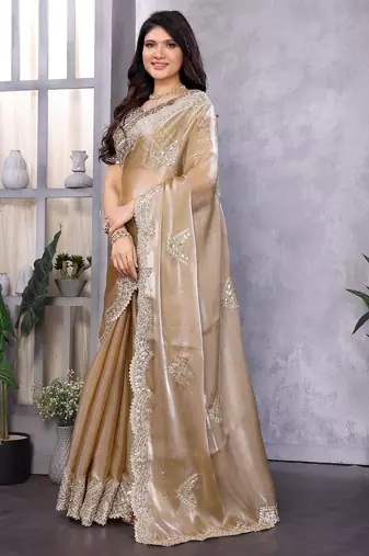 Beige embroidered embellished shimmer chiffon bollywood saree with blouse