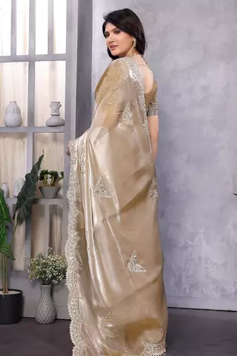 Beige embroidered embellished shimmer chiffon bollywood saree with blouse