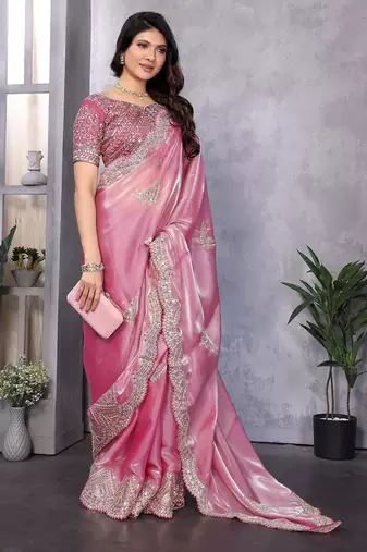Light pink embroidered embellished shimmer chiffon bollywood saree with blouse