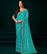 Sky blue embroidered embellished bollywood net saree with blouse