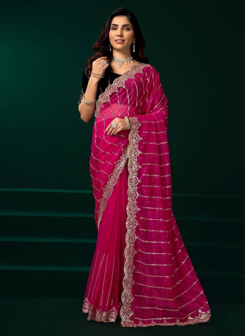 Dark pink embroidered embellished bollywood net saree with blouse