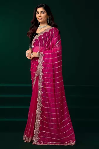 Dark pink embroidered embellished bollywood net saree with blouse
