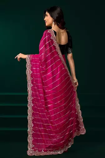 Dark pink embroidered embellished bollywood net saree with blouse