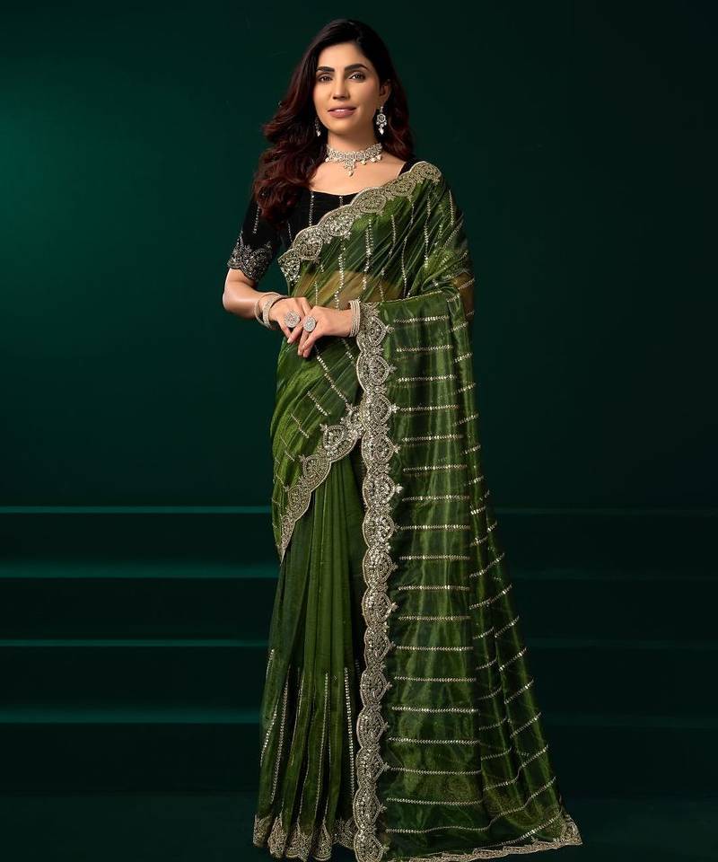 Green embroidered embellished bollywood net saree with blouse