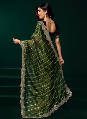 Green embroidered embellished bollywood net saree with blouse 4