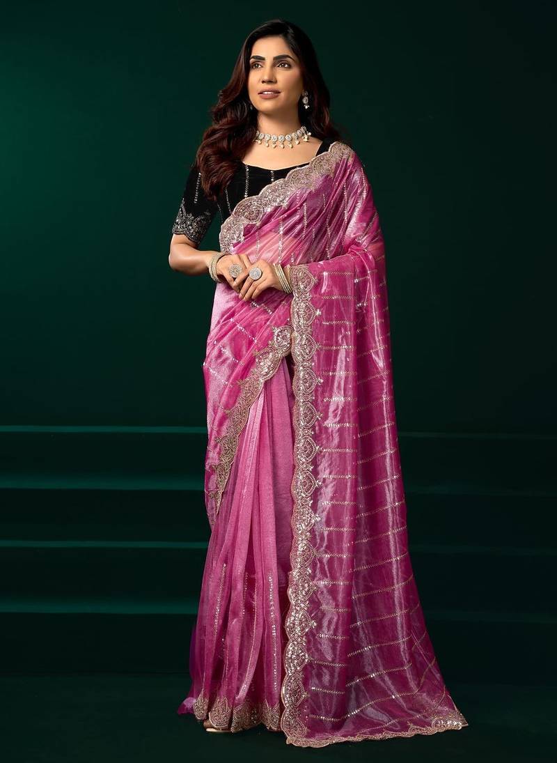 Light pink embroidered embellished bollywood net saree with blouse