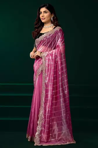 Light pink embroidered embellished bollywood net saree with blouse