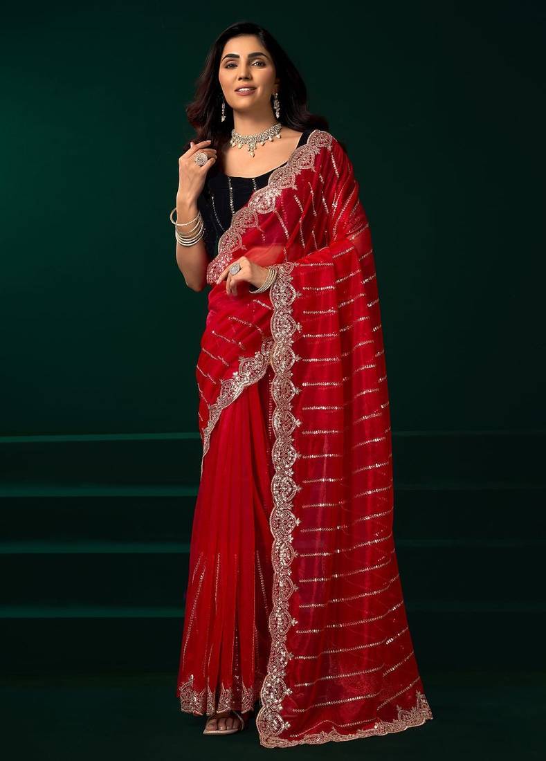 Red embroidered embellished bollywood net saree with blouse