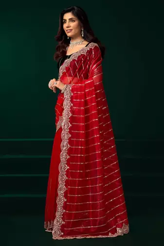 Red embroidered embellished bollywood net saree with blouse