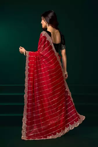 Red embroidered embellished bollywood net saree with blouse